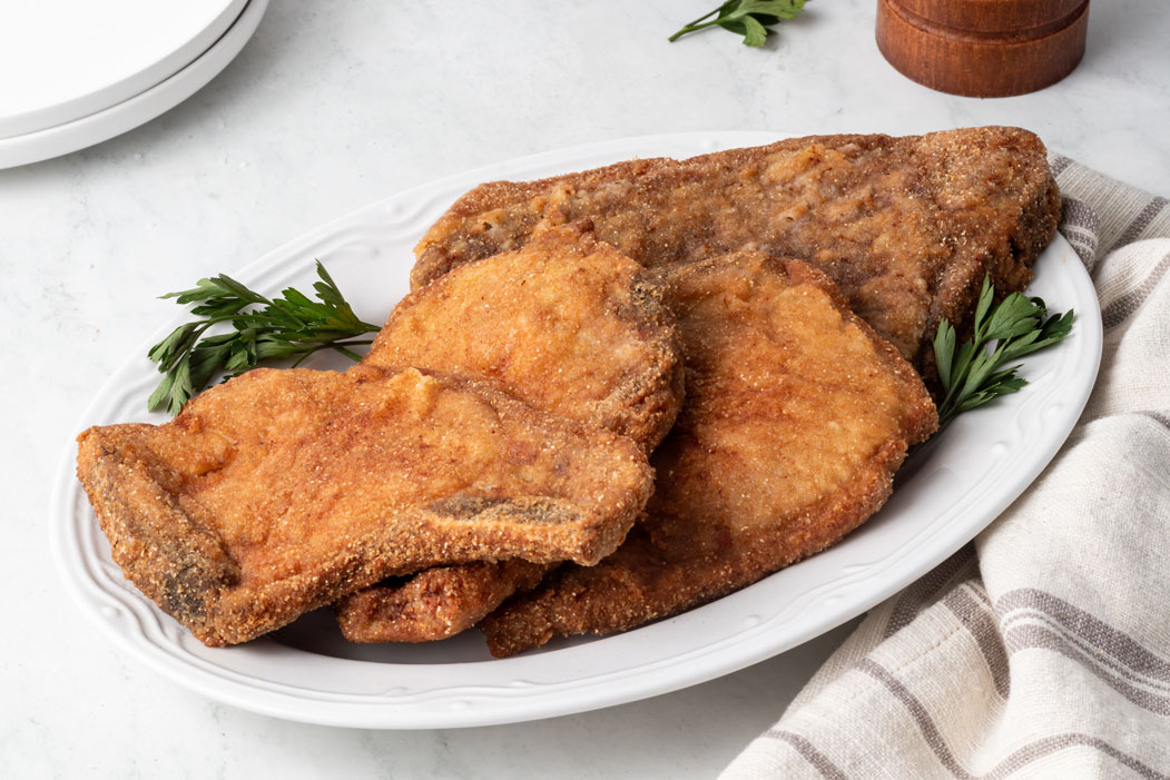 Fry Krisp Food Products fournit des panures, des pâtes à frire, des enrobages et des mélanges spéciaux de qualité supérieure.